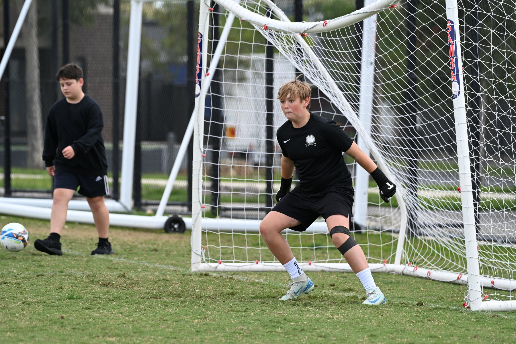 Keeper ready in goalmouth